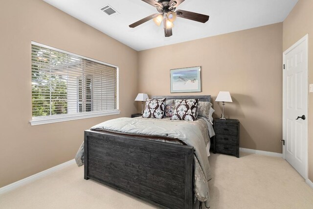 9201 Silver Pine Cv, Austin, TX 78733 - carpeted bedroom with baseboards and a ceiling fan
