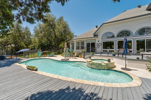 9201 Silver Pine Cv, Austin, TX 78733 - view of pool with fence, a patio, a pool with connected hot tub, and a wooden deck