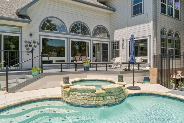 9201 Silver Pine Cv, Austin, TX 78733 - view of pool featuring a pool with connected hot tub and a patio