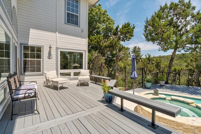 9201 Silver Pine Cv, Austin, TX 78733 - deck with fence and a pool with connected hot tub