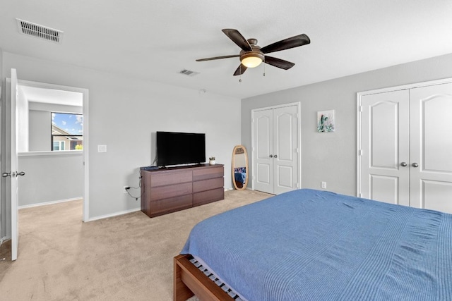 806 Sawbuck Dr, Pflugerville, TX 78660 - bedroom with two closets, light carpet, and a ceiling fan