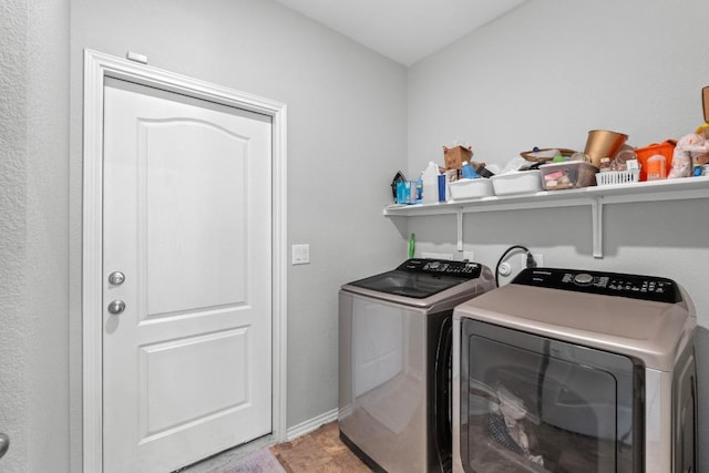 806 Sawbuck Dr, Pflugerville, TX 78660 - laundry room with independent washer and dryer and light wood-type flooring