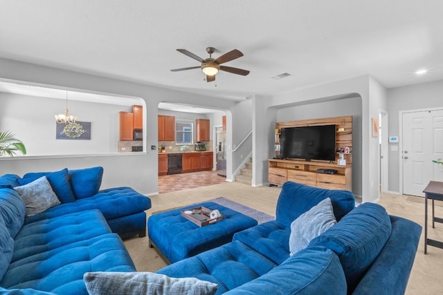806 Sawbuck Dr, Pflugerville, TX 78660 - living area featuring light colored carpet, a ceiling fan, a chandelier, stairway, and recessed lighting
