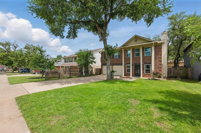 8805 Ravello Pass, Austin, TX 78749 - view of front of house with driveway, a chimney, brick siding, and an attached garage