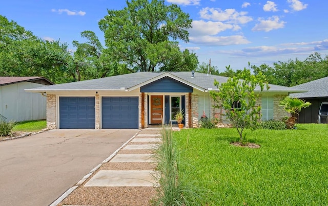 single story home with concrete driveway, a garage, stone siding, and a front yard
