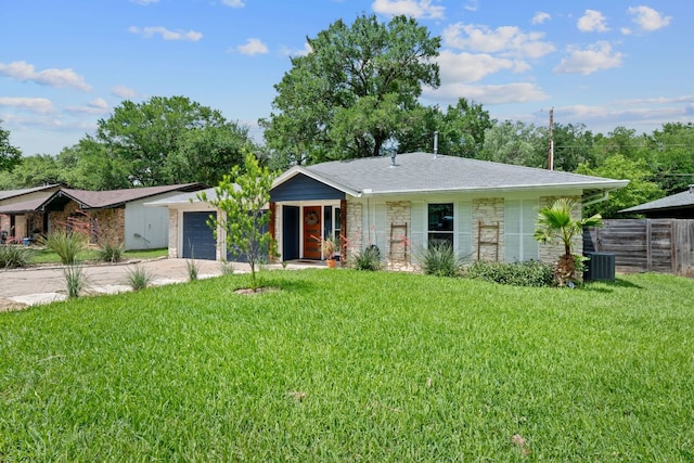 2612 Baxter Dr, Austin, TX 78745 - view of front of property with stone siding, driveway, and central air condition unit