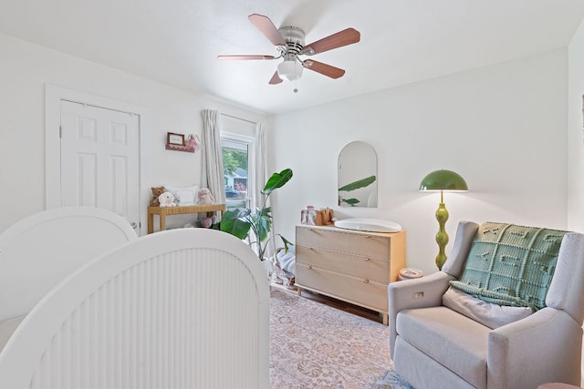 2612 Baxter Dr, Austin, TX 78745 - bedroom with a ceiling fan and wood finished floors