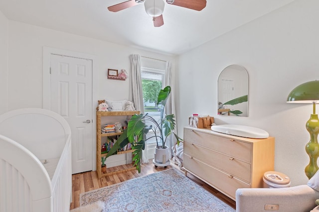 2612 Baxter Dr, Austin, TX 78745 - bedroom with wood finished floors and a ceiling fan