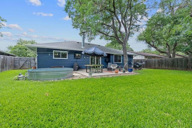 rear view of house with a patio area
