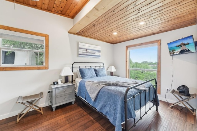 913 Lake Shore Dr, Spicewood, TX 78669 - bedroom featuring wooden ceiling, multiple windows, baseboards, dark wood-type flooring, and recessed lighting