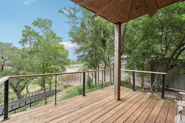 913 Lake Shore Dr, Spicewood, TX 78669 - wooden terrace with a water view
