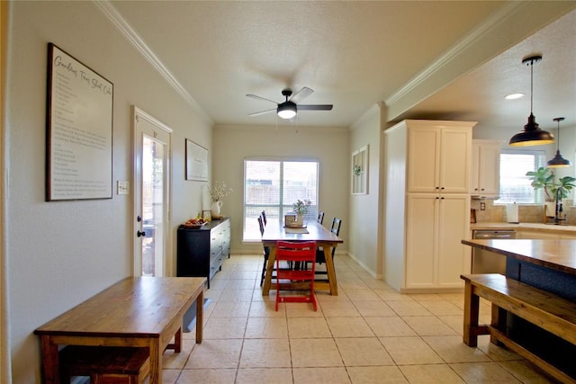 2502 Joseph Dr, Copperas Cove, TX 76522 - dining room featuring a ceiling fan, crown molding, light tile patterned flooring, a textured ceiling, and baseboards