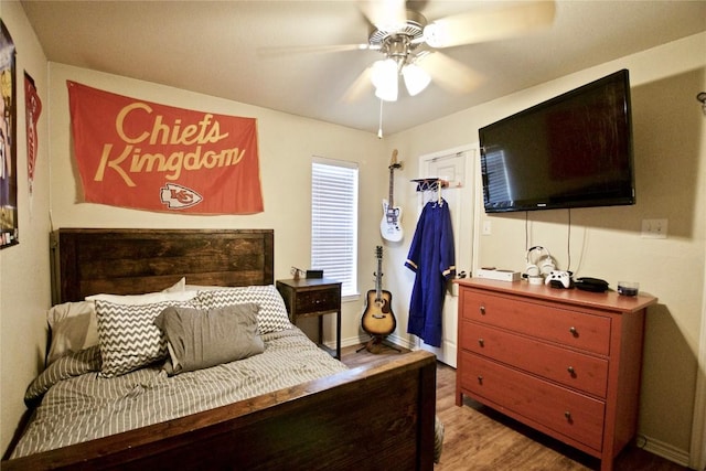2502 Joseph Dr, Copperas Cove, TX 76522 - bedroom featuring wood finished floors and a ceiling fan