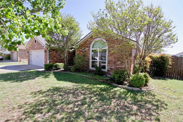 2502 Joseph Dr, Copperas Cove, TX 76522 - view of front facade featuring an attached garage, brick siding, and driveway