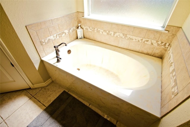 2502 Joseph Dr, Copperas Cove, TX 76522 - bathroom featuring plenty of natural light, a bath, and tile patterned floors