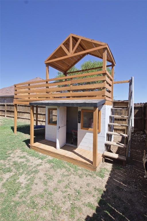 2502 Joseph Dr, Copperas Cove, TX 76522 - back of property with a deck, stairs, and fence