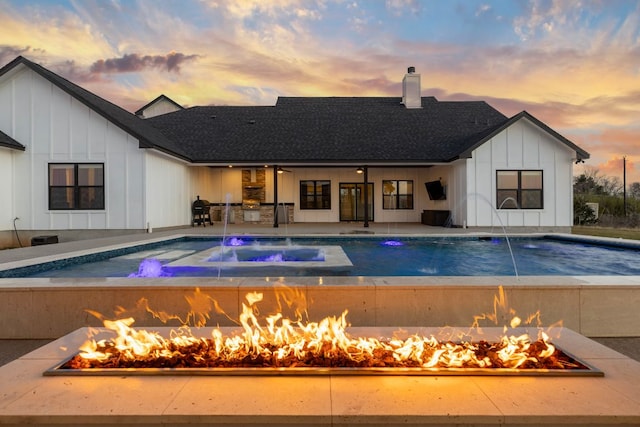 479 Brown Rd, Mcdade, TX 78650 - view of swimming pool featuring an outdoor fire pit, a patio, and a jacuzzi