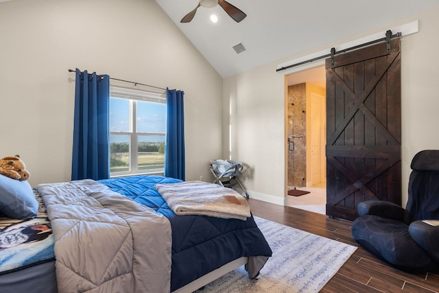 479 Brown Rd, Mcdade, TX 78650 - bedroom with high vaulted ceiling, a barn door, dark wood-style flooring, baseboards, and ceiling fan