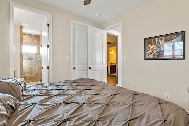 479 Brown Rd, Mcdade, TX 78650 - bedroom featuring ensuite bathroom and a ceiling fan