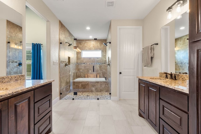 479 Brown Rd, Mcdade, TX 78650 - full bath with a tile shower, two vanities, and baseboards