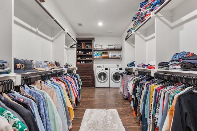 479 Brown Rd, Mcdade, TX 78650 - spacious closet featuring washing machine and clothes dryer and wood finished floors