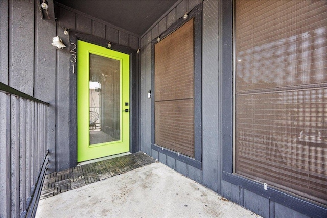 909 Reinli St Unit 231, Austin, TX 78751 - entrance to property featuring board and batten siding