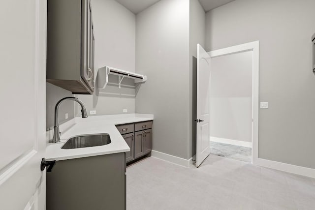 8295 Lime Creek Rd, Volente, TX 78641 - washroom with a sink and baseboards