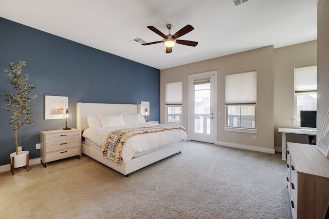 2520 Bluebonnet Ln Unit 41, Austin, TX 78704 - bedroom with light colored carpet, access to exterior, baseboards, and ceiling fan
