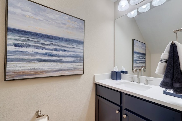 2520 Bluebonnet Ln Unit 41, Austin, TX 78704 - bathroom with vanity and lofted ceiling