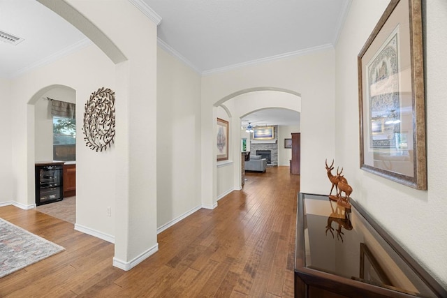 2518 Nightshade Dr, Cedar Park, TX 78613 - hall featuring hardwood / wood-style floors, ornamental molding, and baseboards