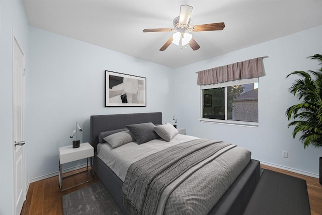 2518 Nightshade Dr, Cedar Park, TX 78613 - bedroom featuring wood finished floors, baseboards, and a ceiling fan