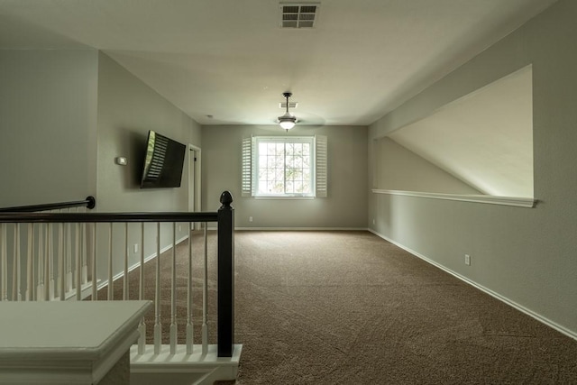 8610 Axis Dr, Austin, TX 78749 - bonus room featuring carpet floors, baseboards, and lofted ceiling
