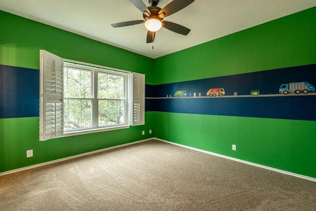 8610 Axis Dr, Austin, TX 78749 - empty room with carpet floors, a ceiling fan, and baseboards