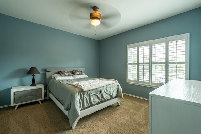 8610 Axis Dr, Austin, TX 78749 - bedroom featuring carpet, baseboards, and a ceiling fan