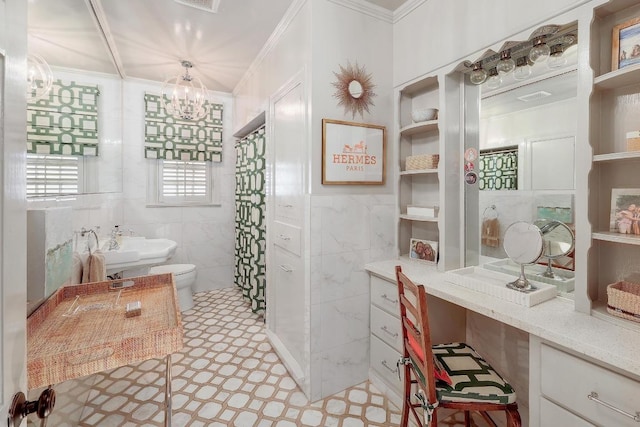 full bathroom with toilet, tile walls, crown molding, a chandelier, and tile patterned floors