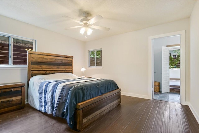 3508 Winfield Cv, Austin, TX 78704 - bedroom with hardwood / wood-style floors, multiple windows, and baseboards