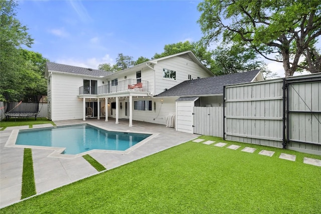 3115 Thousand Oaks Dr, Austin, TX 78746 - rear view of property with a balcony, a gate, a patio area, and a shingled roof