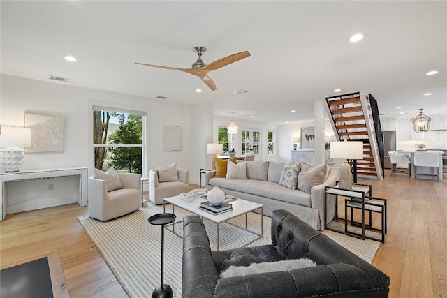3115 Thousand Oaks Dr, Austin, TX 78746 - living area featuring healthy amount of natural light, recessed lighting, a ceiling fan, and light wood-type flooring