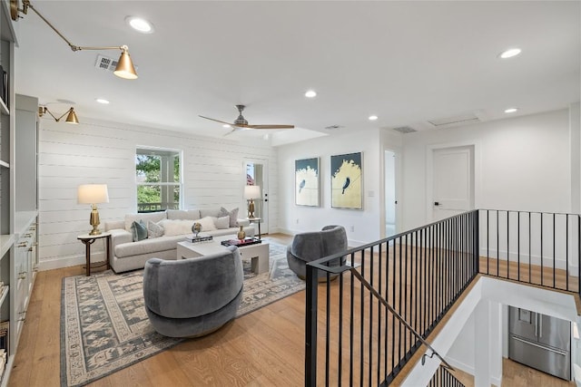 3115 Thousand Oaks Dr, Austin, TX 78746 - living area featuring light wood-style flooring, recessed lighting, ceiling fan, and baseboards