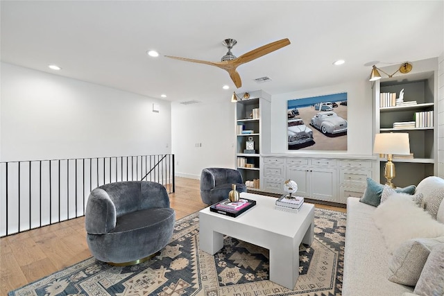 3115 Thousand Oaks Dr, Austin, TX 78746 - living room featuring light wood-style flooring, a ceiling fan, recessed lighting, and built in features
