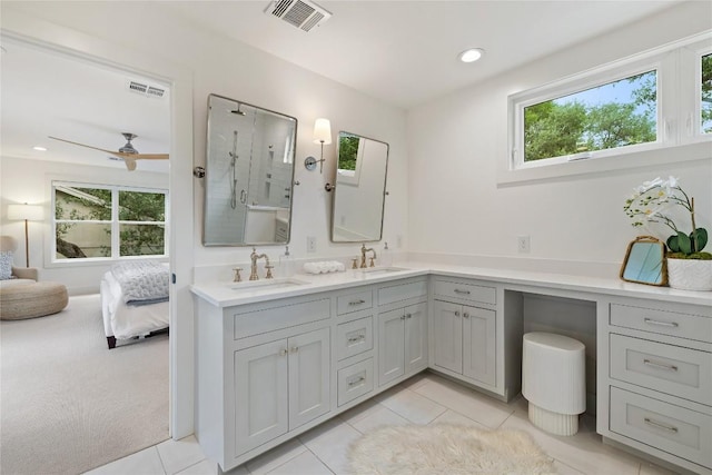 3115 Thousand Oaks Dr, Austin, TX 78746 - bathroom with plenty of natural light, a stall shower, double vanity, ceiling fan, and recessed lighting