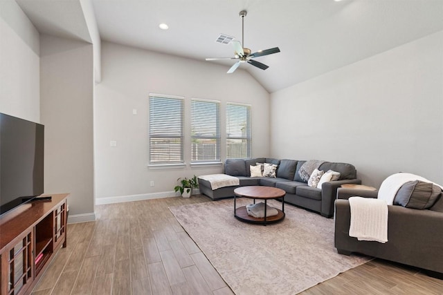 living area with vaulted ceiling, wood finished floors, a ceiling fan, baseboards, and recessed lighting