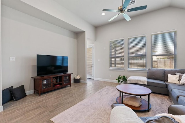 living room with wood finished floors, ceiling fan, baseboards, recessed lighting, and lofted ceiling
