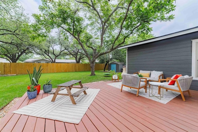 8313 Burrell Dr, Austin, TX 78757 - deck featuring a storage shed, an outdoor living space, and an outbuilding