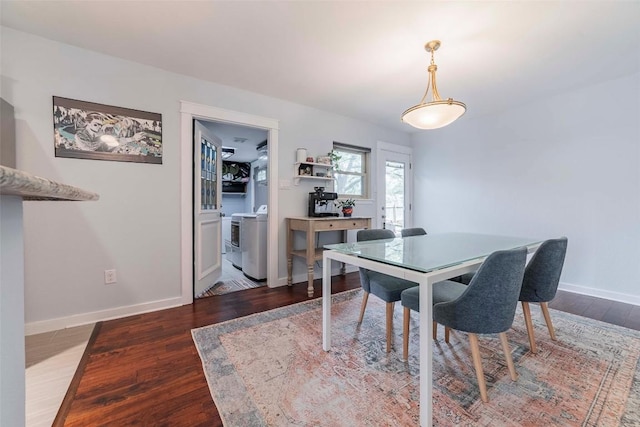 8313 Burrell Dr, Austin, TX 78757 - dining area featuring independent washer and dryer, wood finished floors, and baseboards