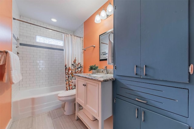 8313 Burrell Dr, Austin, TX 78757 - bathroom featuring toilet, vanity, shower / bath combination with curtain, and tile patterned floors