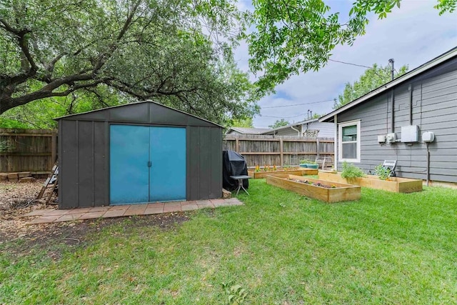 8313 Burrell Dr, Austin, TX 78757 - view of shed featuring a vegetable garden