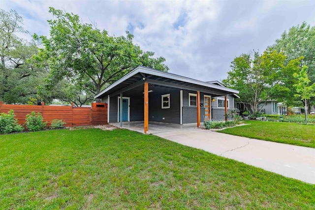 8313 Burrell Dr, Austin, TX 78757 - view of front of property with driveway and a carport