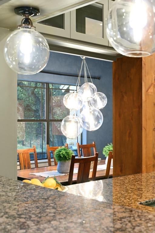 209 Ridge View Dr, Georgetown, TX 78628 - dining space with a chandelier
