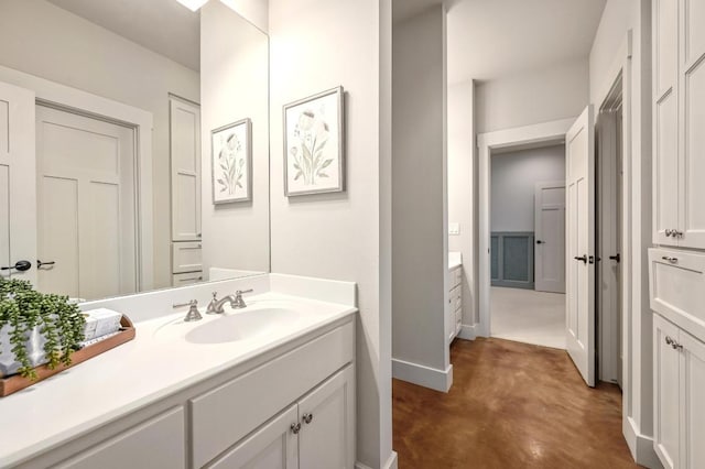 209 Ridge View Dr, Georgetown, TX 78628 - bathroom featuring vanity and baseboards